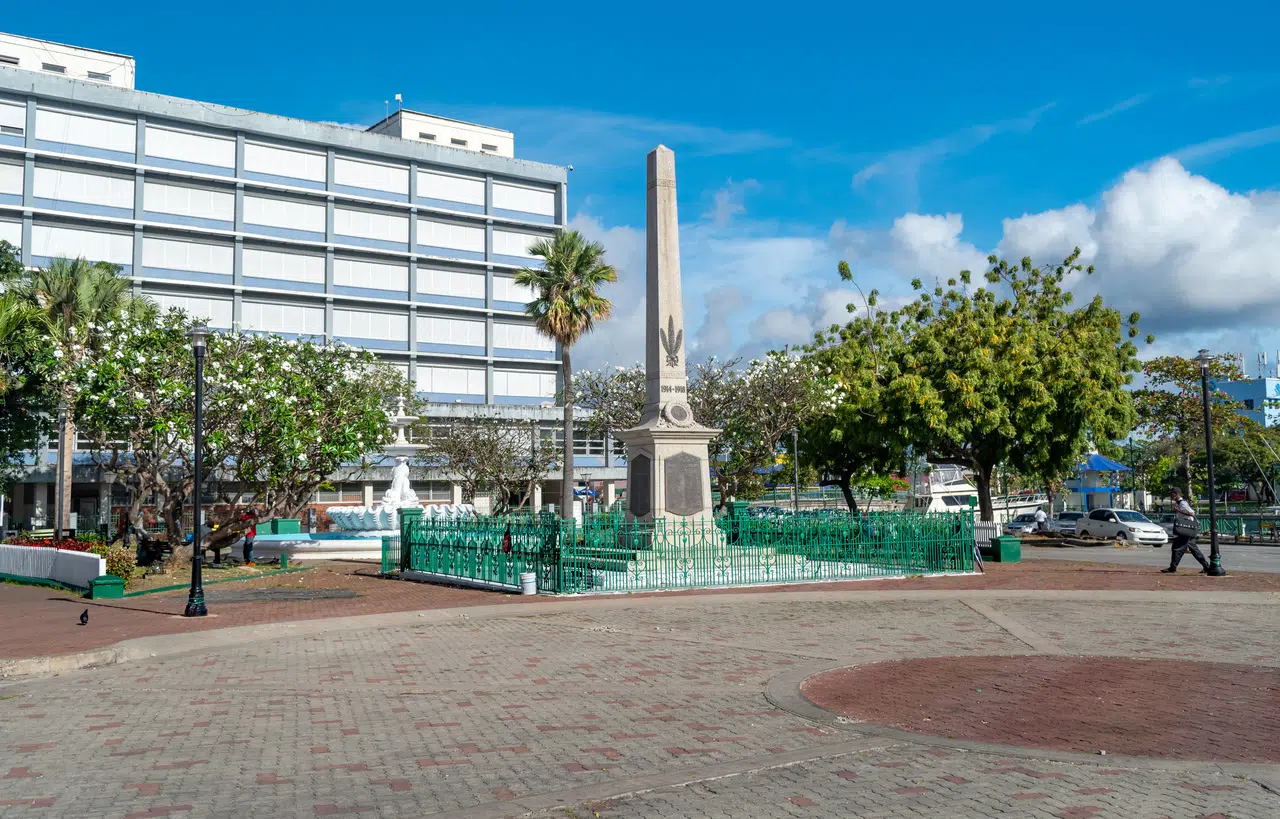 downtown square with brick walkway and palm tree and historic ma