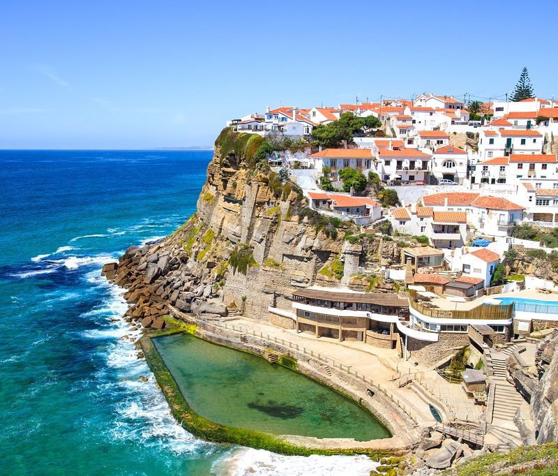 azenhas do mar white village, cliff and ocean, sintra, portugal.